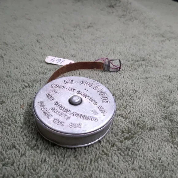 Vintage tape measure ahlswede dry goods souvenir Austin Texas